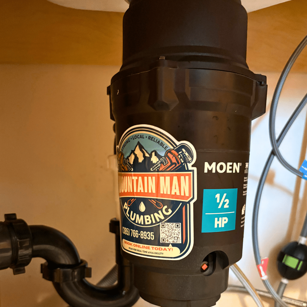 ewly installed Moen garbage disposal by Mountain Man Plumbing