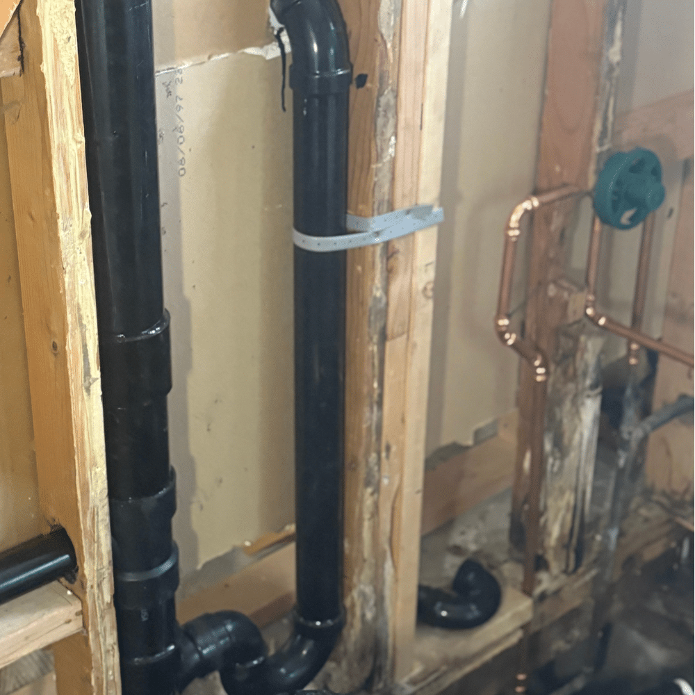 Completed upgraded shower drain piping and new valve installation in Holladay, Utah by Mountain Man Plumbing.