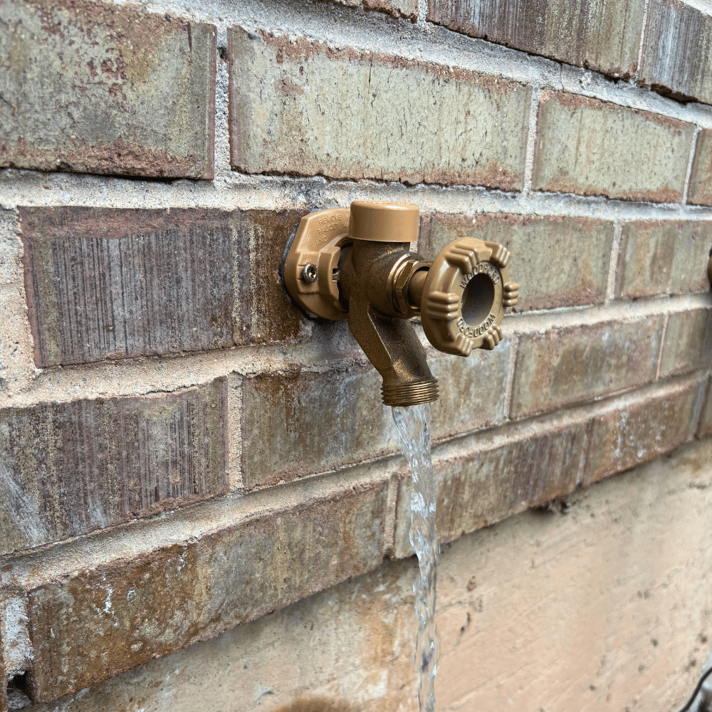 New hose bib installation flowing water Salt Lake City