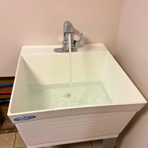 Salt Lake City laundry sink install with new basin and drain setup