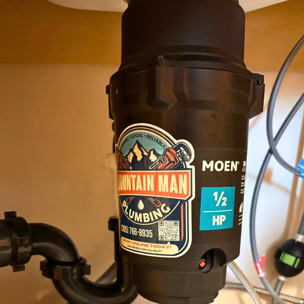 ewly installed Moen garbage disposal by Mountain Man Plumbing