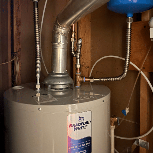 Code-compliant seismic strapping on a new water heater in West Valley City.
