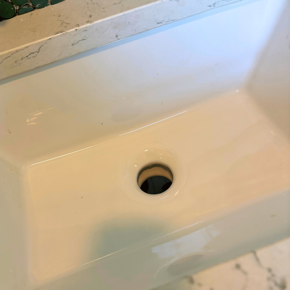 Completed drain and P-trap installation under Salt Lake City bathroom sink