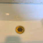 Completed drain and P-trap installation under Salt Lake City bathroom sink