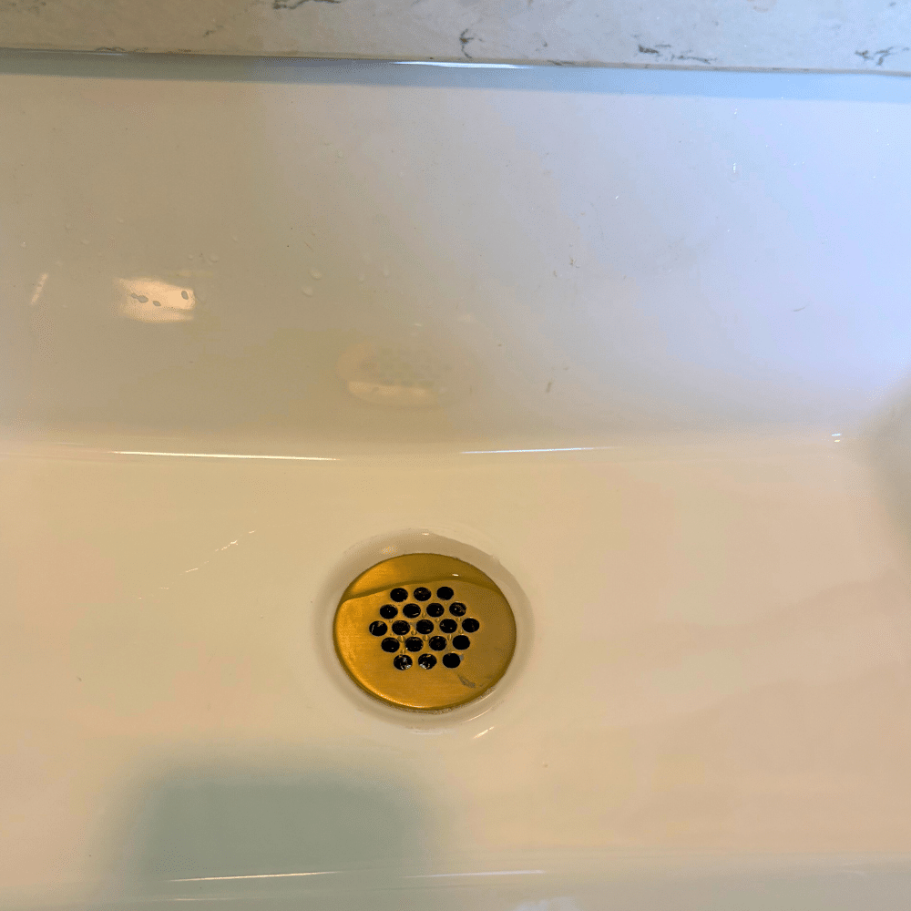 Completed drain and P-trap installation under Salt Lake City bathroom sink