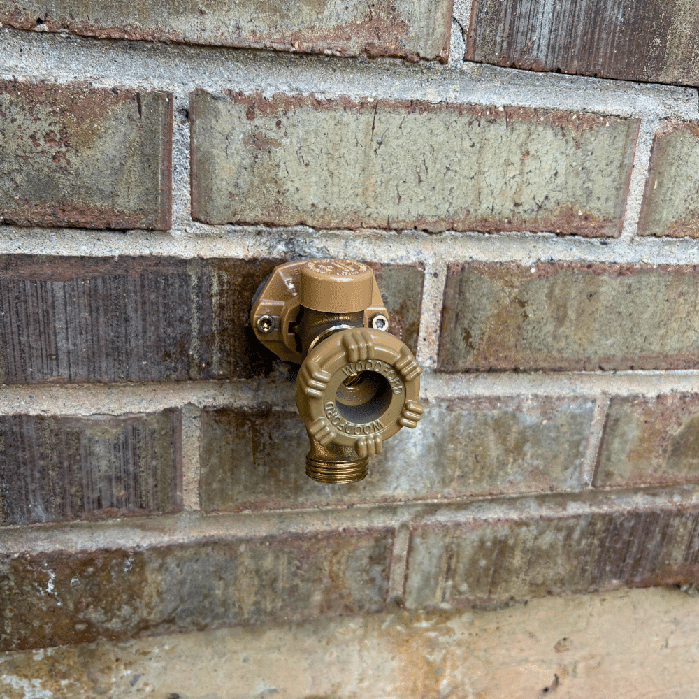 New hose bib installation flowing water Salt Lake City