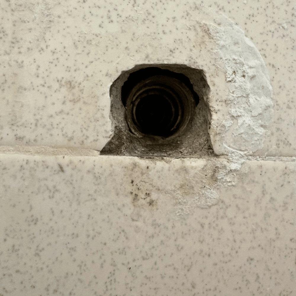 Failed shower valve stems removed during a completed shower repair in Midvale, Utah