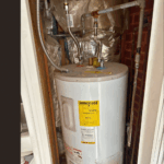 Bradford White electric water heater featuring Mountain Man Plumbing badge, Salt Lake City installation.