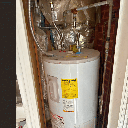 Bradford White electric water heater featuring Mountain Man Plumbing badge, Salt Lake City installation.