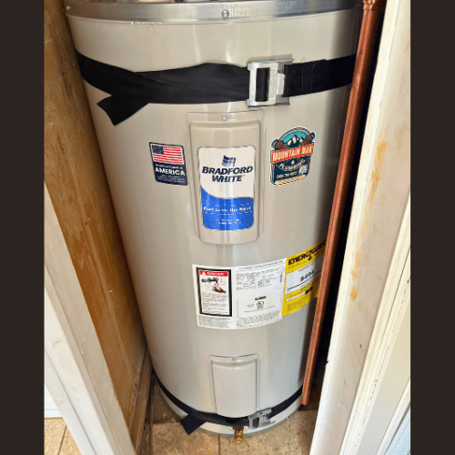 Bradford White electric water heater featuring Mountain Man Plumbing badge, Salt Lake City installation.