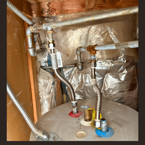 Bradford White electric water heater featuring Mountain Man Plumbing badge, Salt Lake City installation.