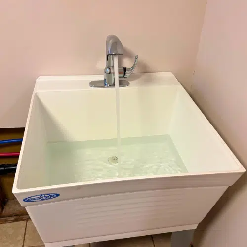 Salt Lake City laundry sink install with new basin and drain setup