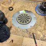 New floor drain and grate installed in Sandy home