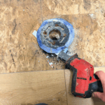 New floor drain and grate installed in Sandy home