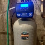 Titan VI water conditioner control head lit display on mineral tank in Park City UT