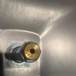 Crew cleaning water heater burner and replacing gas valve — detail photo 4