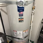 Bradford White tank face with Built to be the Best label and Mountain Man Plumbing sticker after North Salt Lake install.
