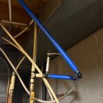 Blue PEX tied into water heater loop with fittings and flexible connectors in Sandy utility area