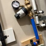 Installed Caleffi PRV above main shutoff on blue PEX water service line after replacement work